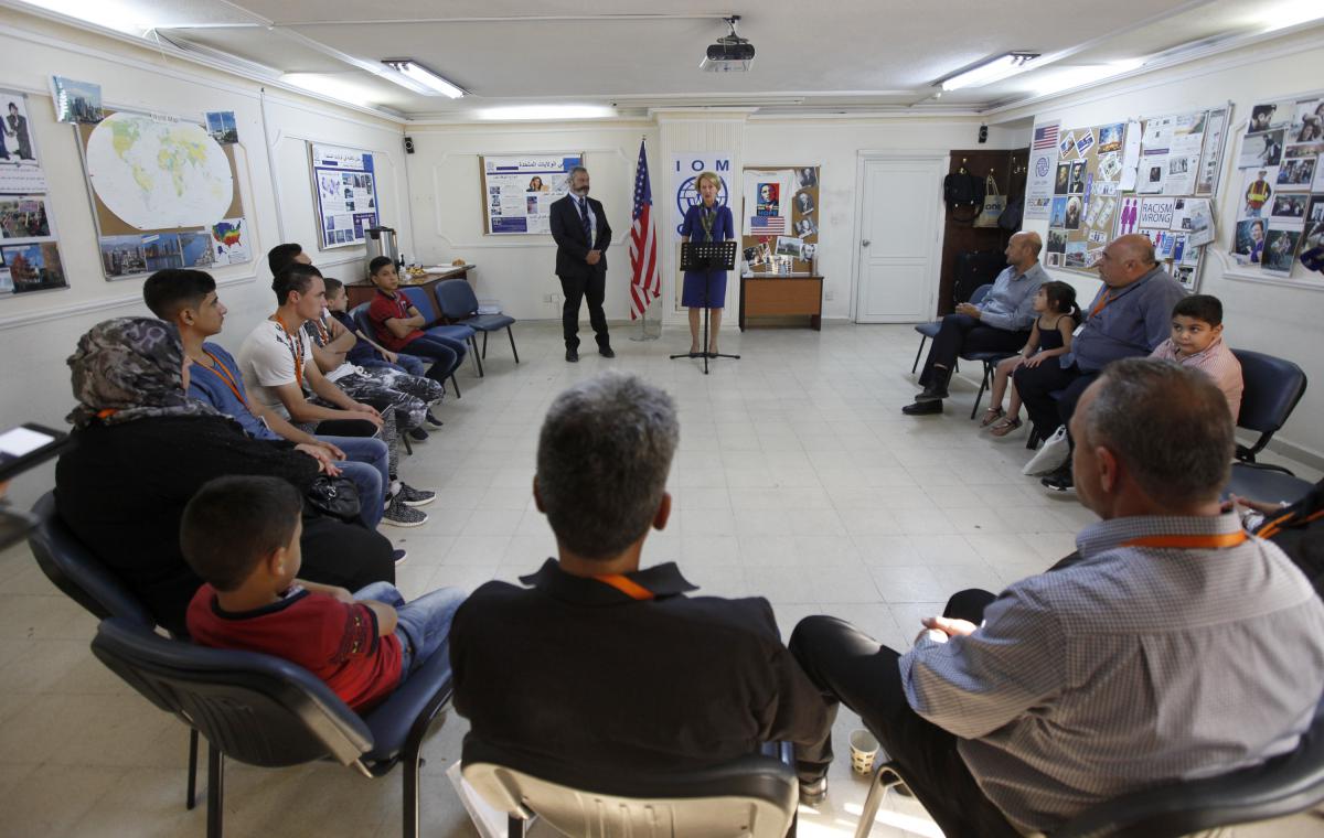 US Ambassador to Jordan, Alice G. Wells, and IOM Chief of Mission, Enrico Ponziani, visiting a group of refugees at IOM’s RSC in Amman. Photo: Victoria Hazou, IOM